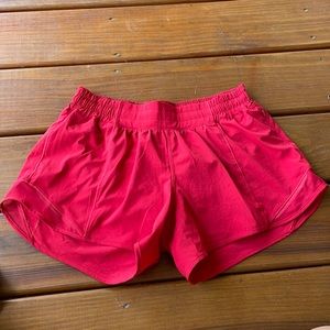 Red Lululemon shorts. Size 8, 4 inch inseam.